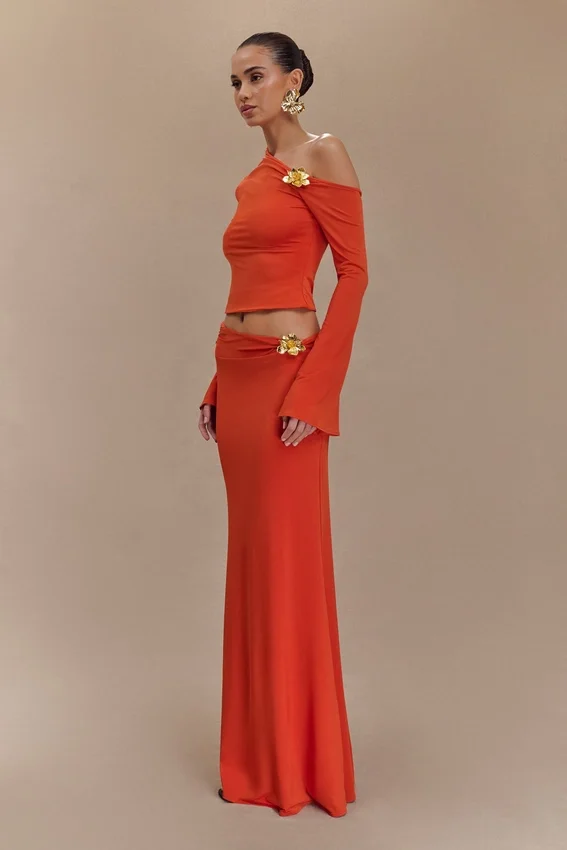 Ainsley Asymmetrical Maxi Skirt With Floral Hardware – Burnt Orange Ainsley Asymmetrical Maxi Skirt With Floral Hardware – Burnt Orange