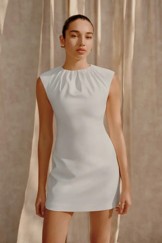 Ariana Pleated Neck Mini Dress – Ivory Ariana Pleated Neck Mini Dress – Ivory