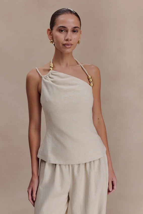 Gabby Asymmetrical Neckline Linen Beaded Top – Natural Gabby Asymmetrical Neckline Linen Beaded Top – Natural