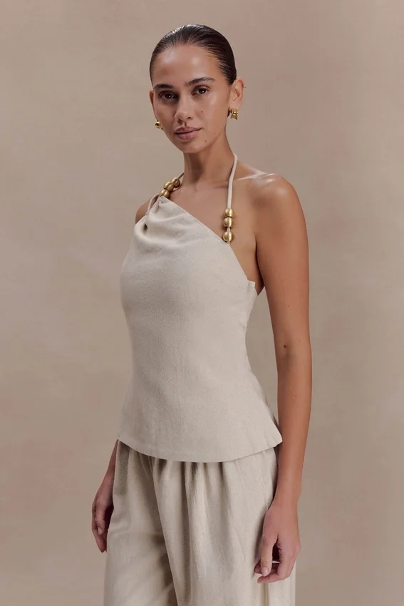 Gabby Asymmetrical Neckline Linen Beaded Top – Natural Gabby Asymmetrical Neckline Linen Beaded Top – Natural