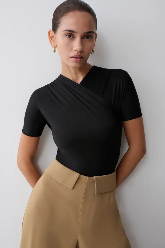 Junie Shortsleeve Cross-Over Bodysuit – Black Junie Shortsleeve Cross-Over Bodysuit – Black